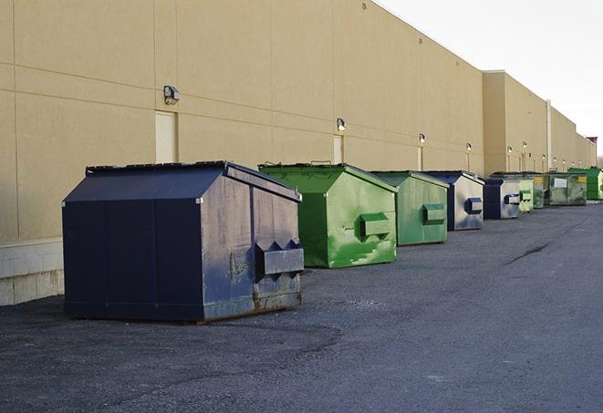 red and green waste bins at a building project in Clarksville